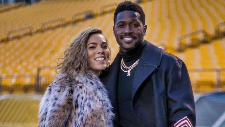 Chelsie kyriss and Antonio Brown posing for photo