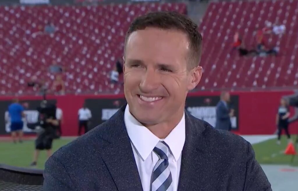 Drew Brees smiling at broadcast booth