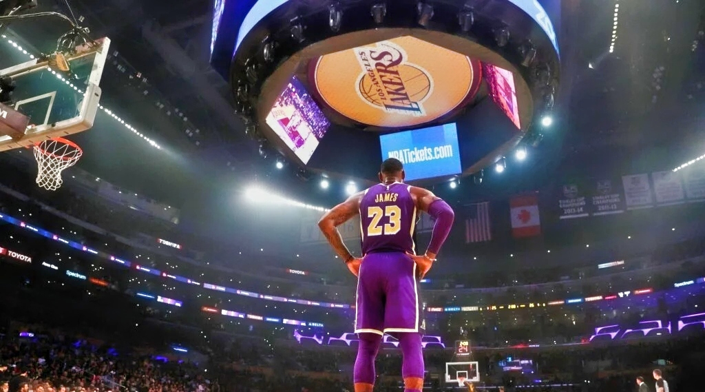 A shot of the Staples Center with LeBron James looking on.
