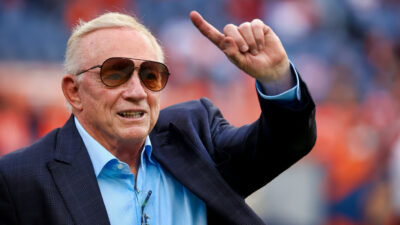 Photo of jerry Jones pointing with index finger
