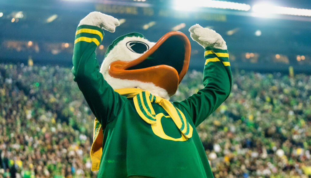 Oregon Ducks maskot Puddles hyping up the crowd during football game