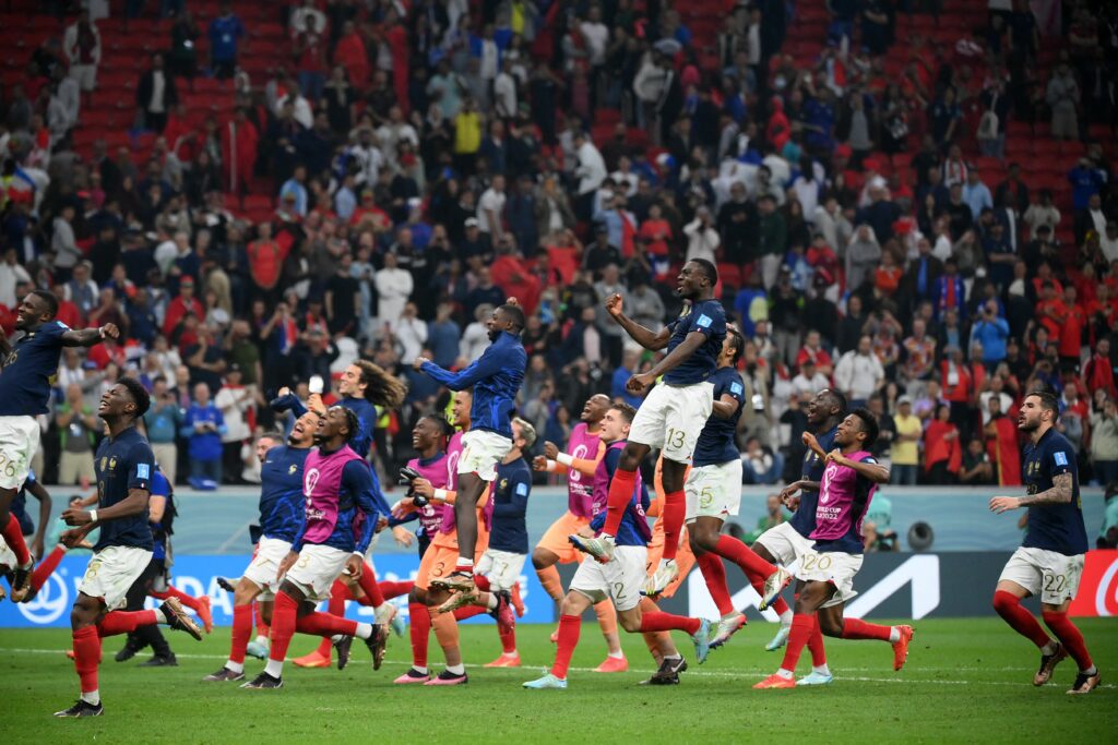 France players celebrate advancing to the 2022 World Cup finals