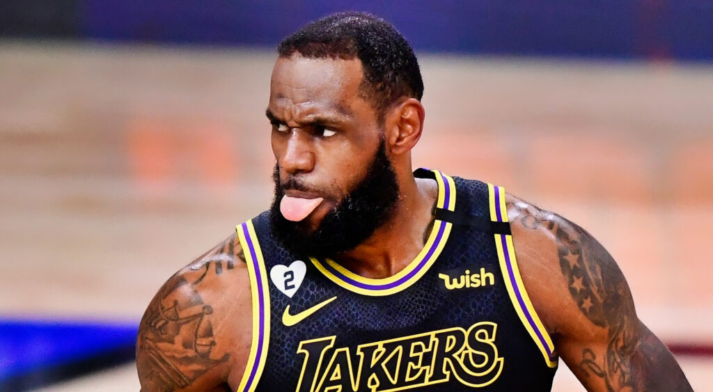 Lebron James on cour sticking out his tongue.
