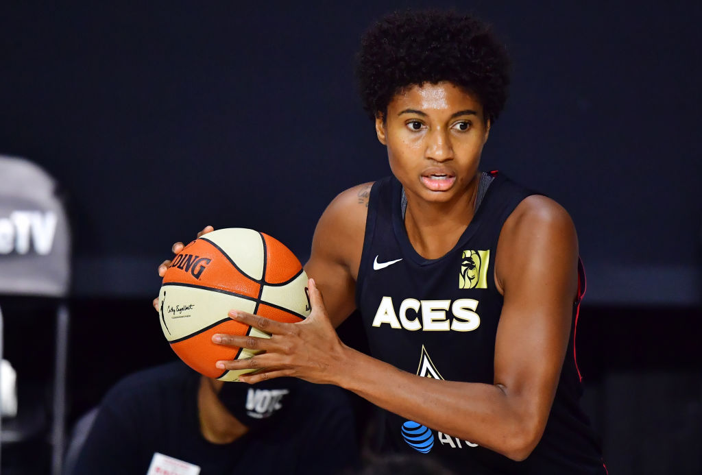 Angel McCoughtry holding basketball