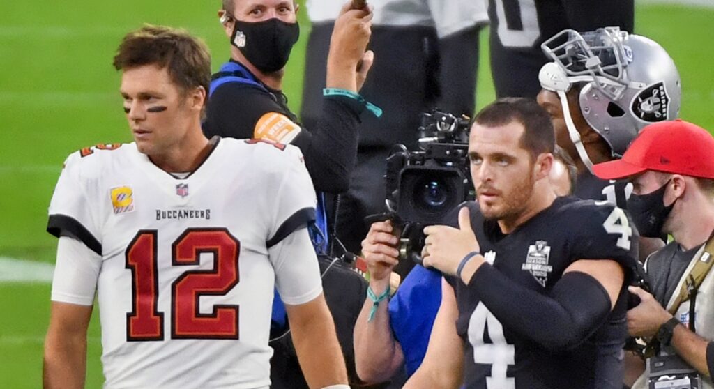 Tom Brady and derek carr in uniform without helmets on