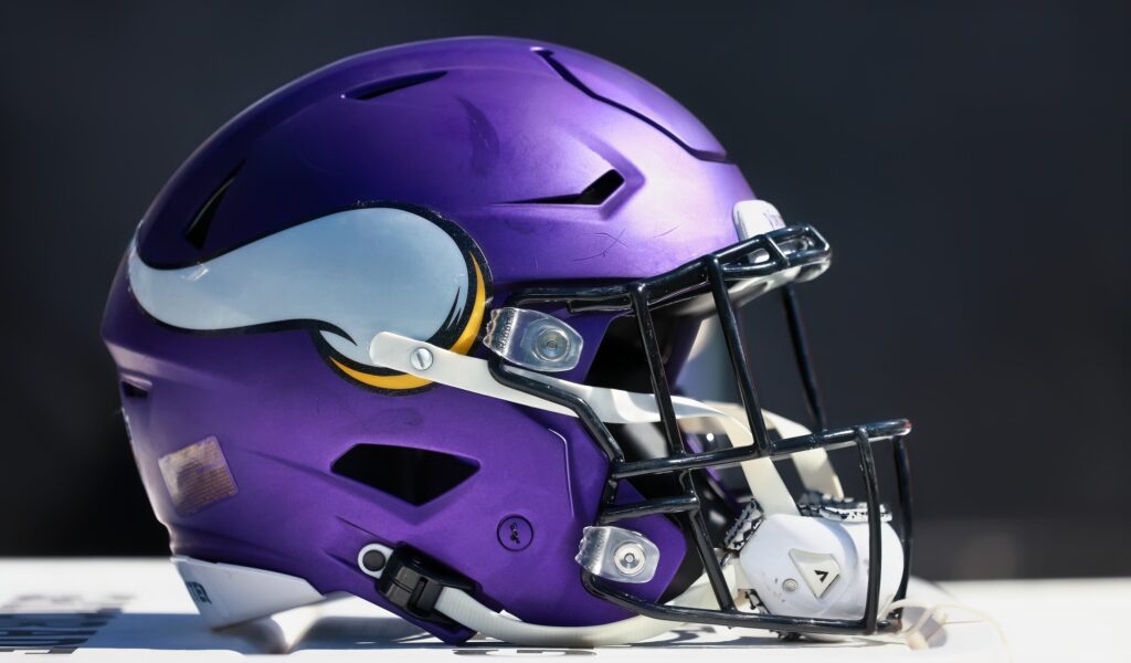 A Minnesota Vikings helmet on a table.