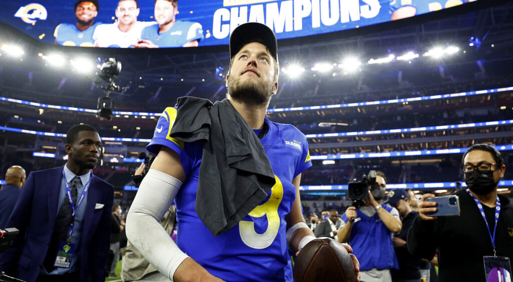 Matthew Stafford celebrates on the field after winning the Super Bowl.