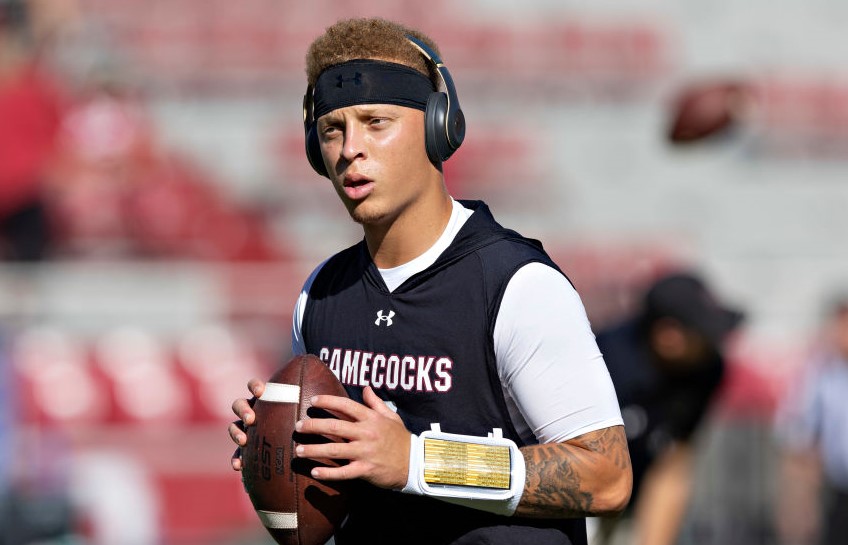 South Carolina Gamecocks quarterback Spencer Rattler warming up at Razorback Stadium.