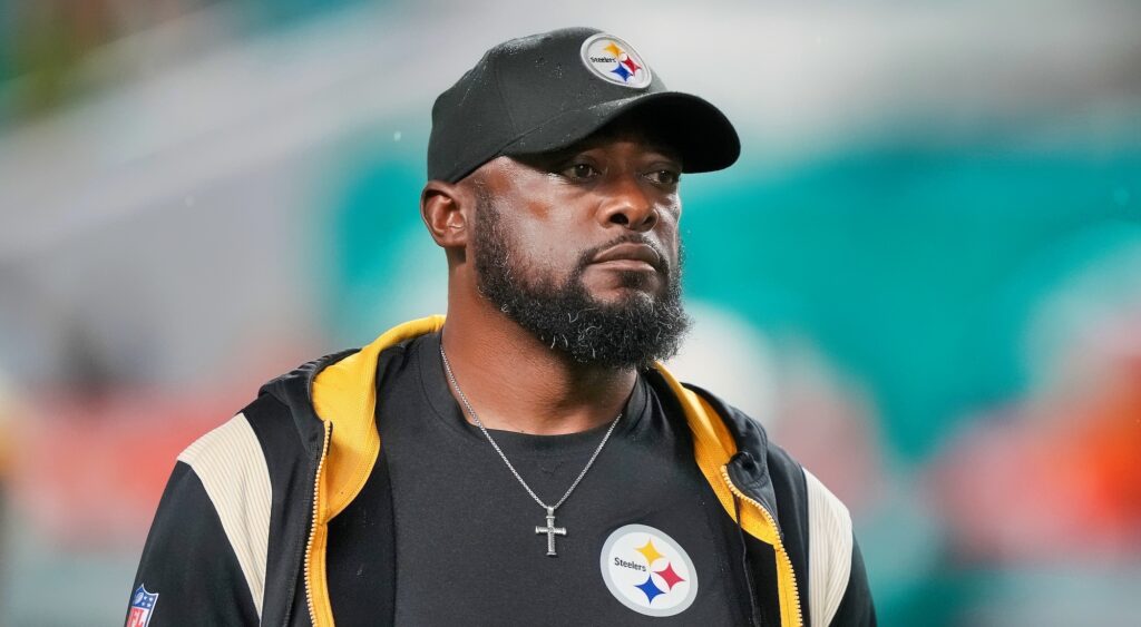 Mike Tomlin watches his team warm up before a game.