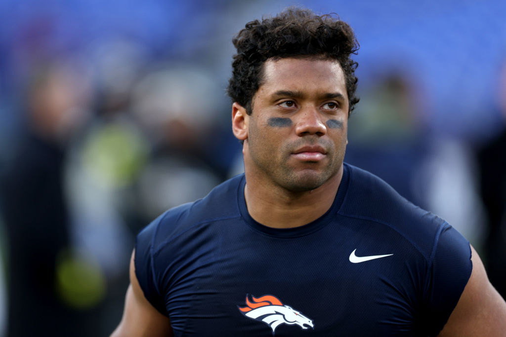 Russell Wilson in a Broncos shirt