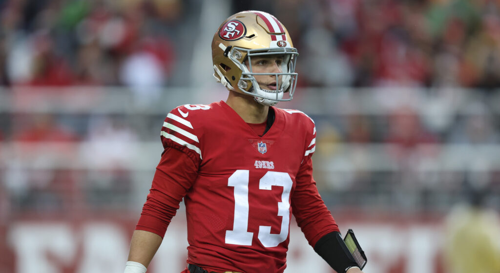 49ers QB Brock Purdy looks on during a game.