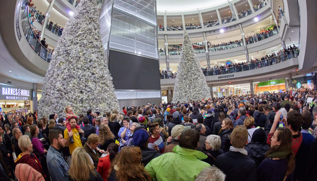 A large crowd gathers inside the Mall of America during Christmas Time.