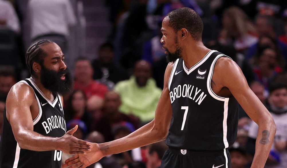 James Harden and Kevin Durant of Brooklyn Nets celebrating a basket.