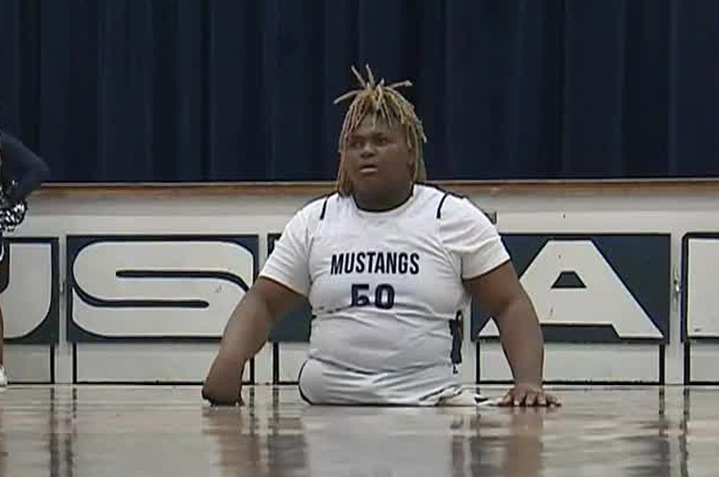 8th Grade Student on court with no legs