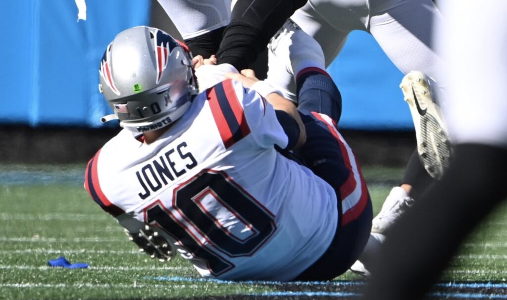 Mac Jones twists a defender's ankle.
