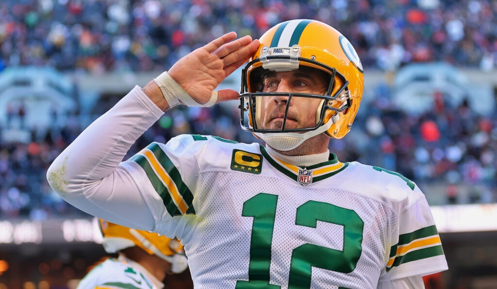 Aaron Rodgers saluting to the crowd.