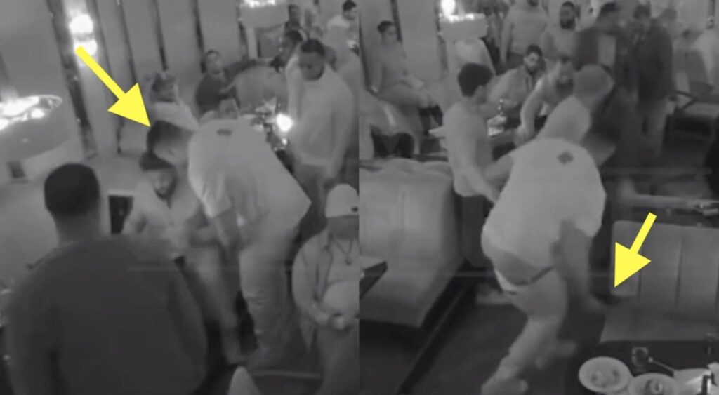 Security footage shows Willie McGinest fighting a man in an L.A. restaurant.