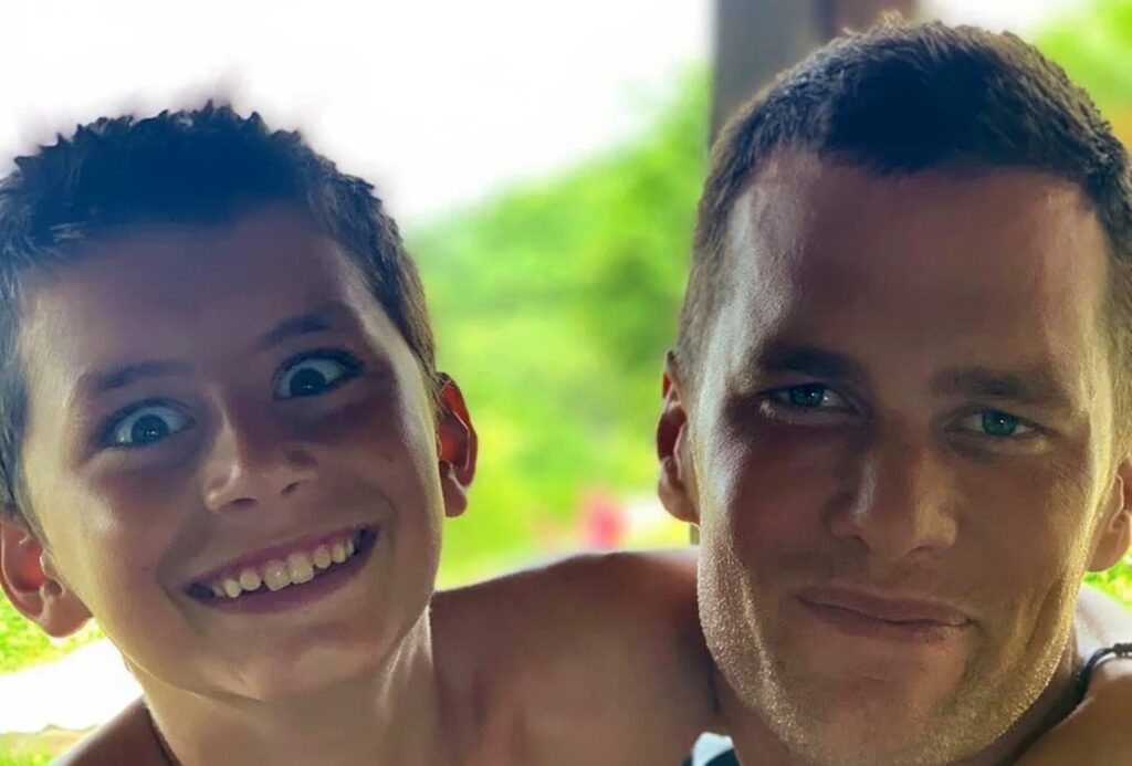 Tom Brady taking selfie with son