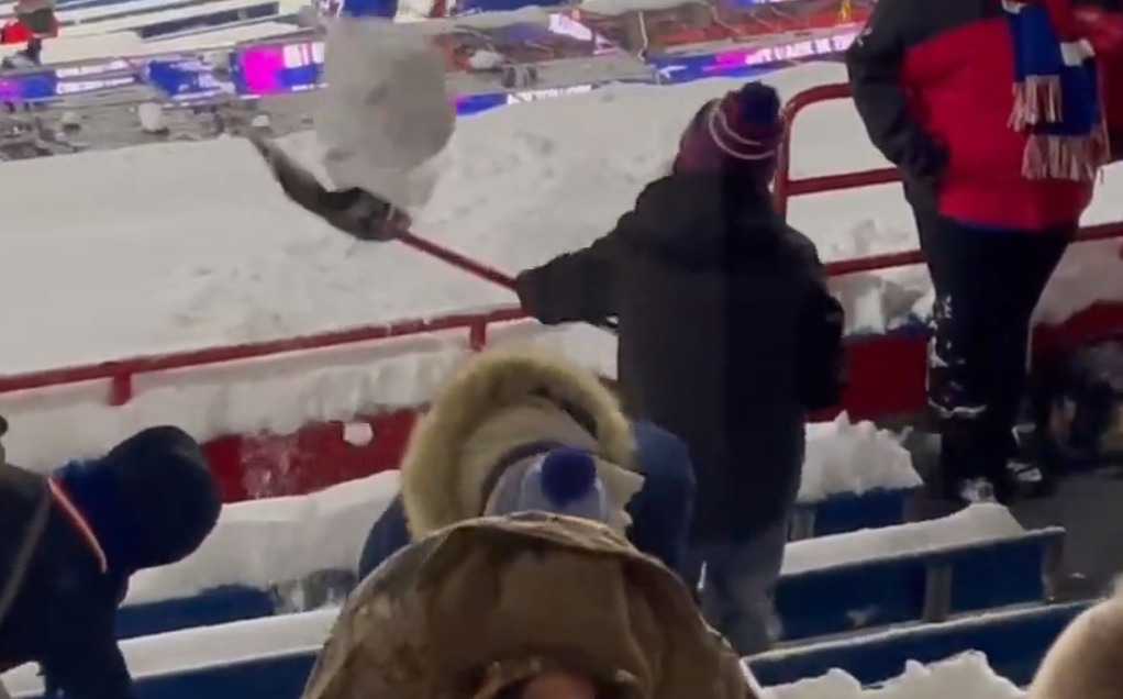 bills fans shoveling snow from seats