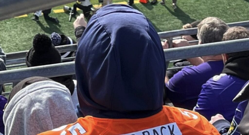 Denver Broncos fan with customized jersey.
