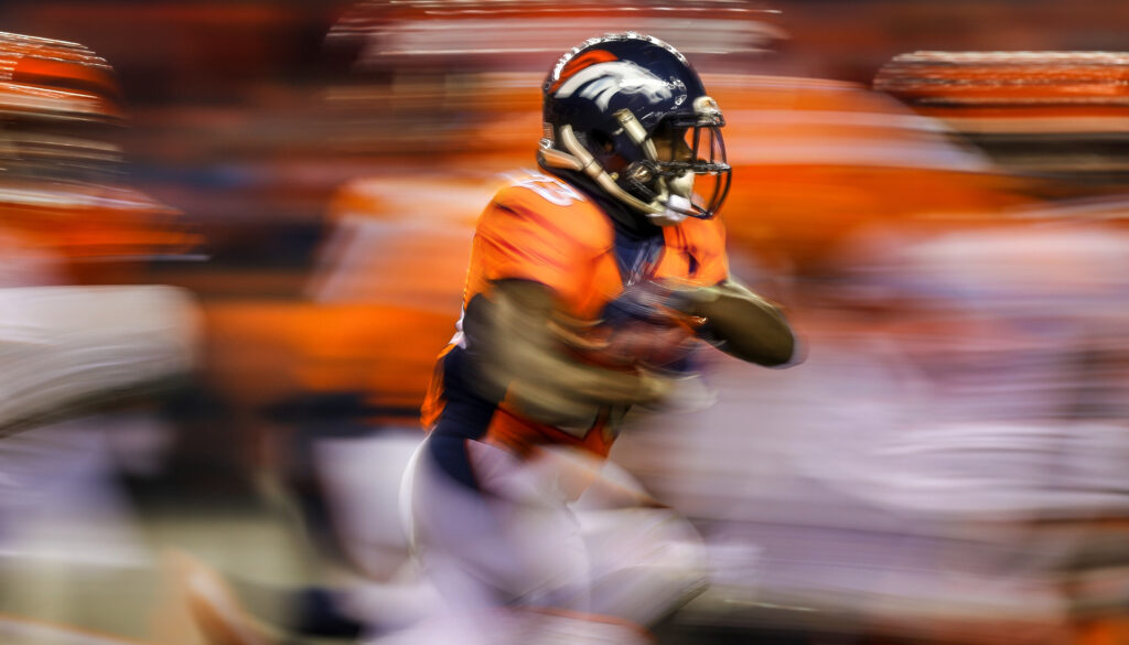 Ronnie Hillman running with the football during a Denver Broncos-Cincinnati Bengals 2015 game.