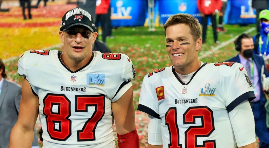 Rob Gronkowski and Tom Brady standing together after Buccaneers win Super Bowl 55.