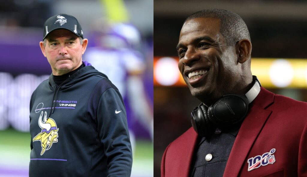 Mike Zimmer in a Vikings hoodie while Deion sanders is in a suit with headphones around neck