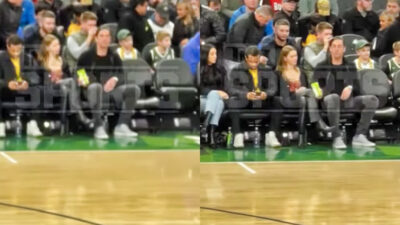 Two photos of Aaron Rodgers and his new GF sharing a snack at NBA game