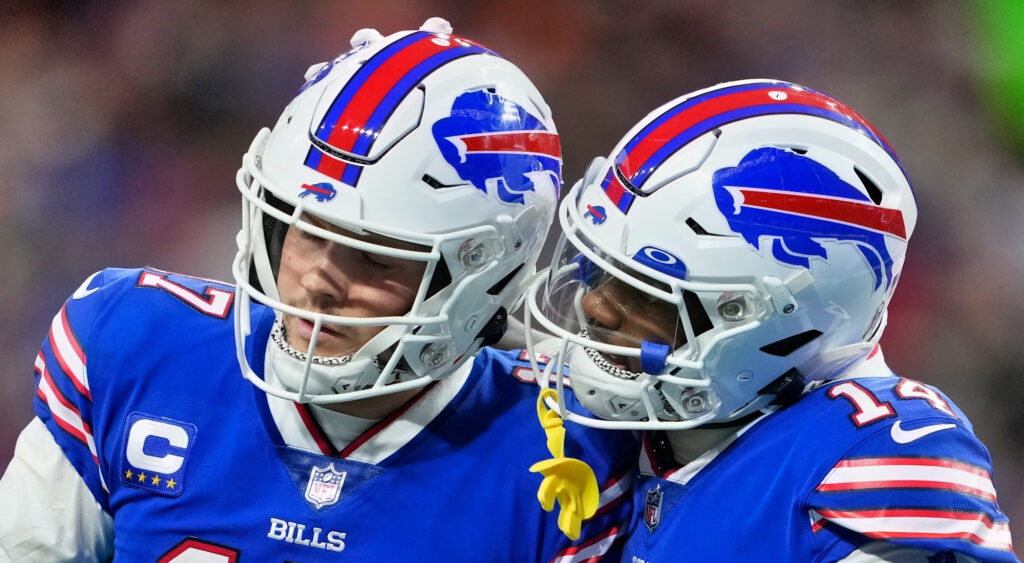 Buffalo Bills quarterback Josh Allen (left) celebrating a touchdown with wide receiver Stefon Diggs (right).