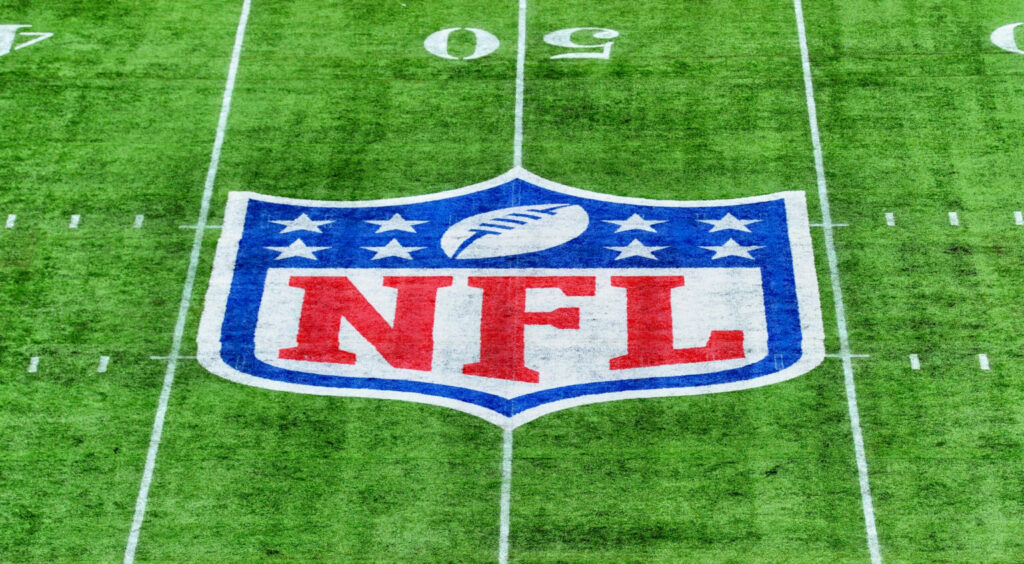 An NFL logo on the field ahead of 2019 game in London, England.