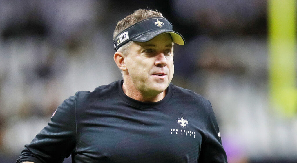 Sean Payton with Saints cap and shirt on
