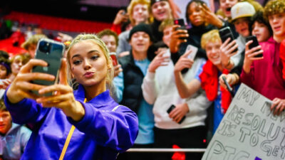 Olivia Dunne taking selfie with fans