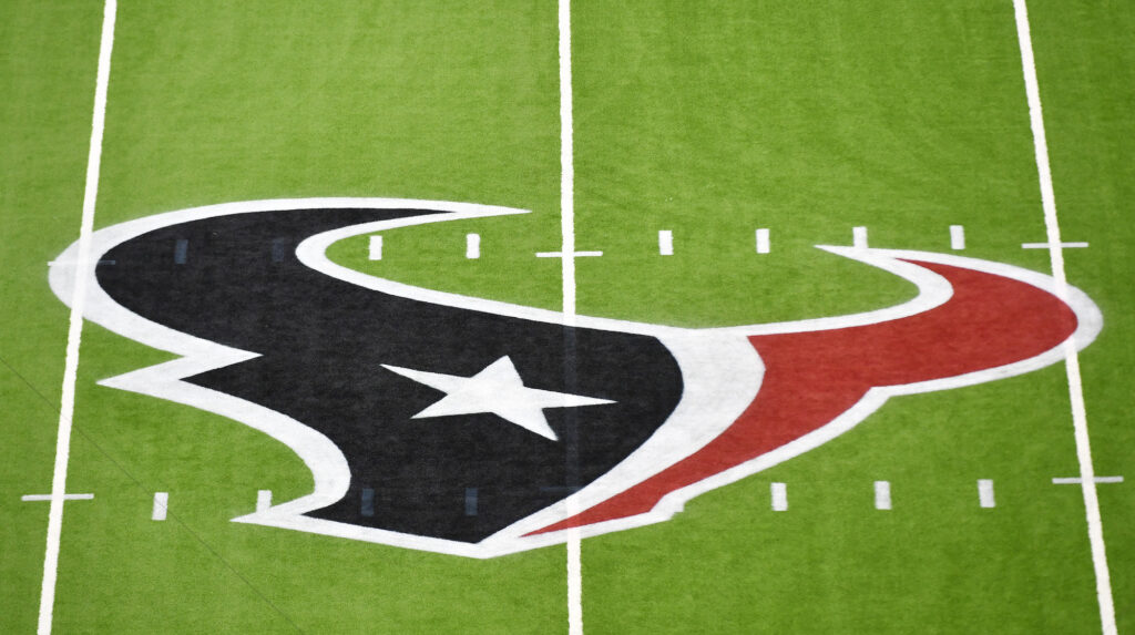 The Houston Texans logo appears on the NRG Stadium field.