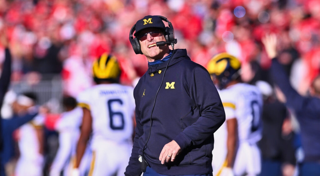 Jim Harbaugh with headset on