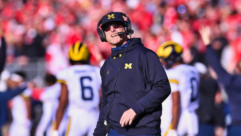 Jim Harbaugh with headset on
