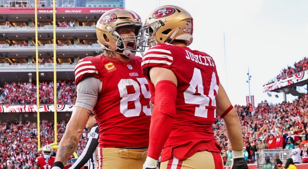 George Kittle and Kyle Juszczyk celebrate a touchdown.