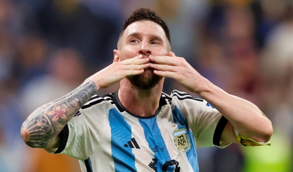 Lionel Messi blows kisses to the crowd at the World Cup.