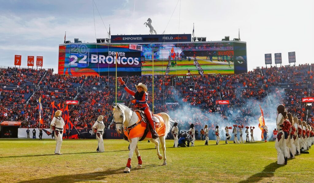 Broncos mascot Thunder rides out onto the field.