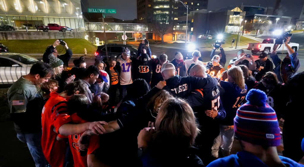 Fans' vigil for Damar Hamlin following player's collapse during NFL game