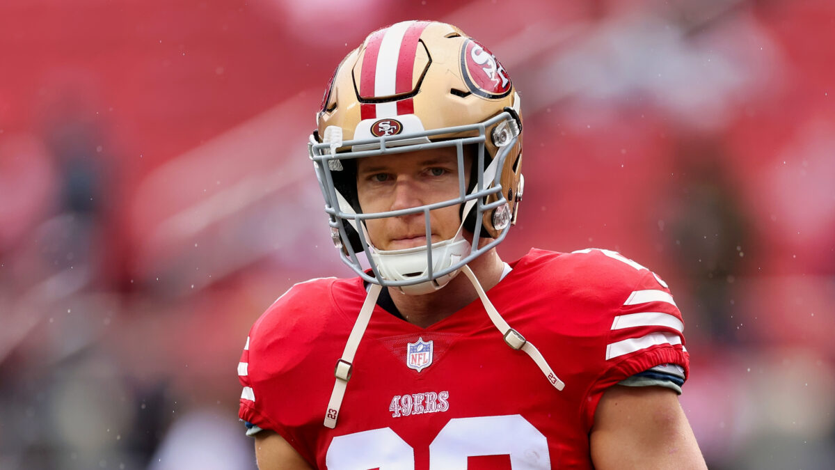 Christian McCaffrey wearing his San Francisco helmet and uniform in a game