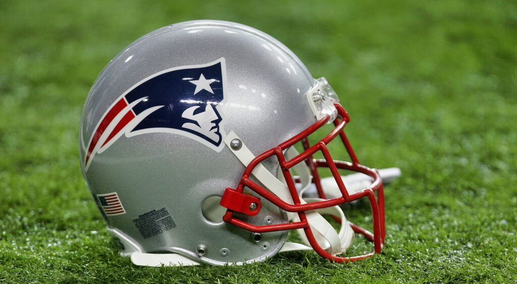 Patriots helmet on field.