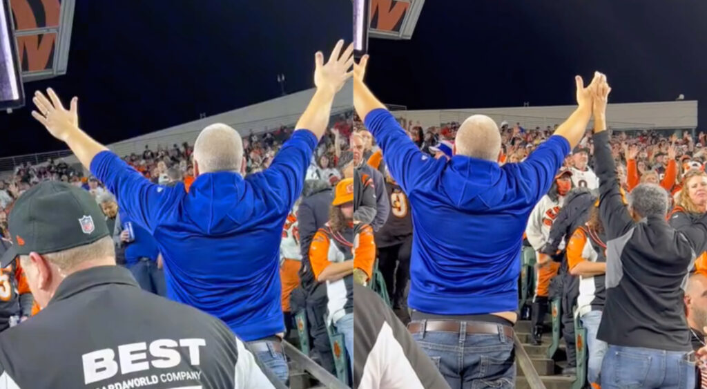 Bills fan leading other fans in prayer during game vs. Bengals