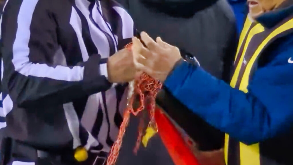 NFL officials working on fixing the chain for the first down marker.