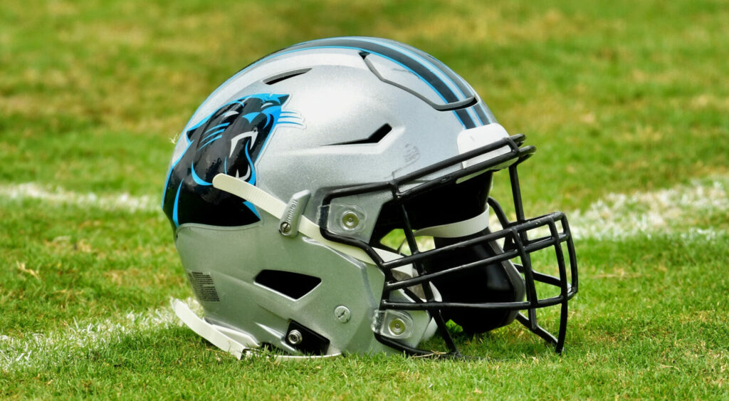 Carolina Panthers helmet on the field during a training camp session.