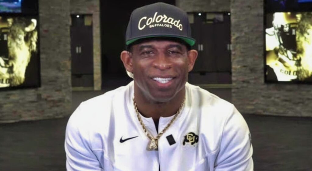 Deion sanders with a Colorado hat on