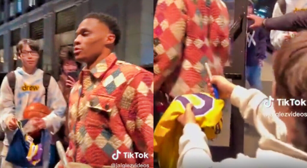 Russell Westbrook in colorful jacket surrounded by fans