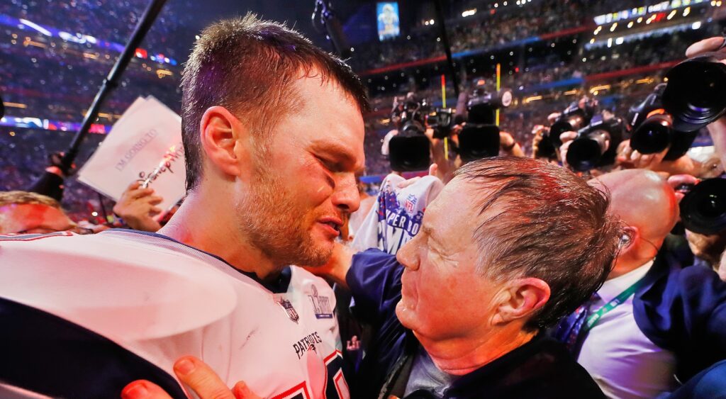 Tom Brady and Bill Belichick looking at each other
