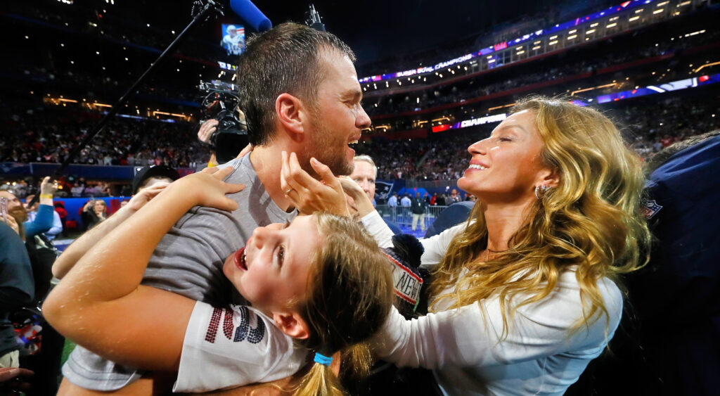 Tom Brady embracing his family