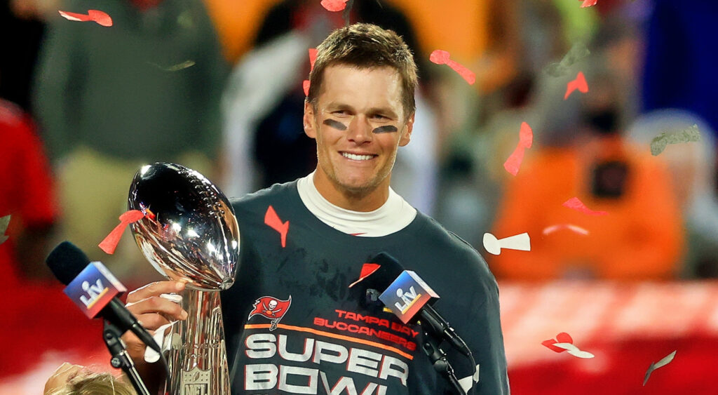 Tom Brady holding the trophy