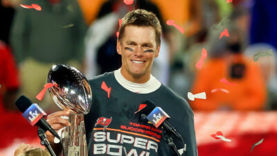 Tom Brady holding trophy